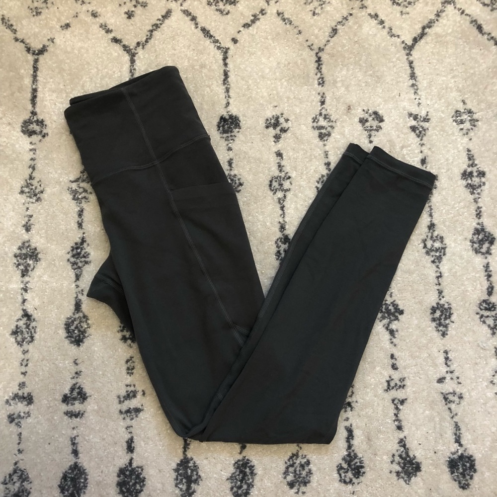 ATHLETA stash pocket salutation tights